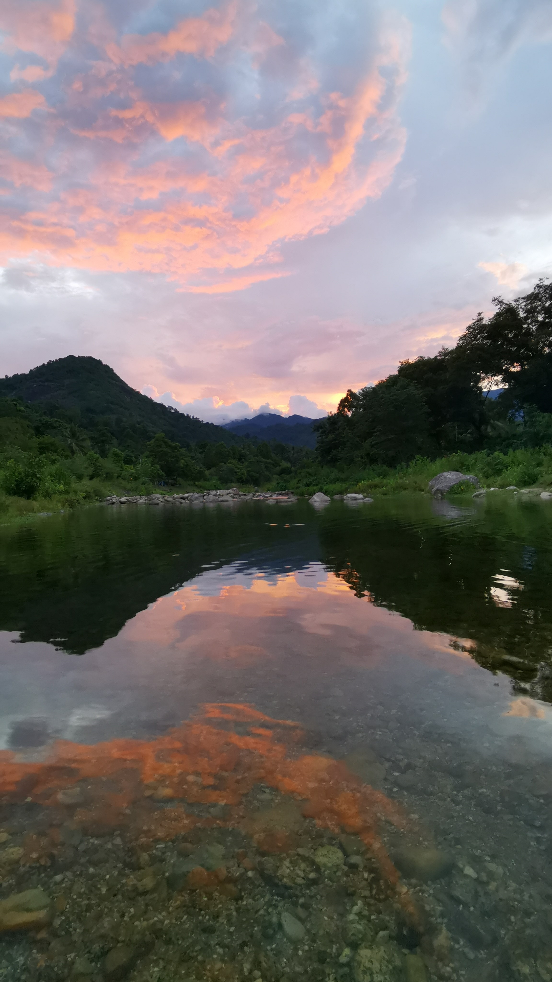 The Golden Hour: The golden hour transition over the Baan Khiri Wong river valley, viewed from the river crossing