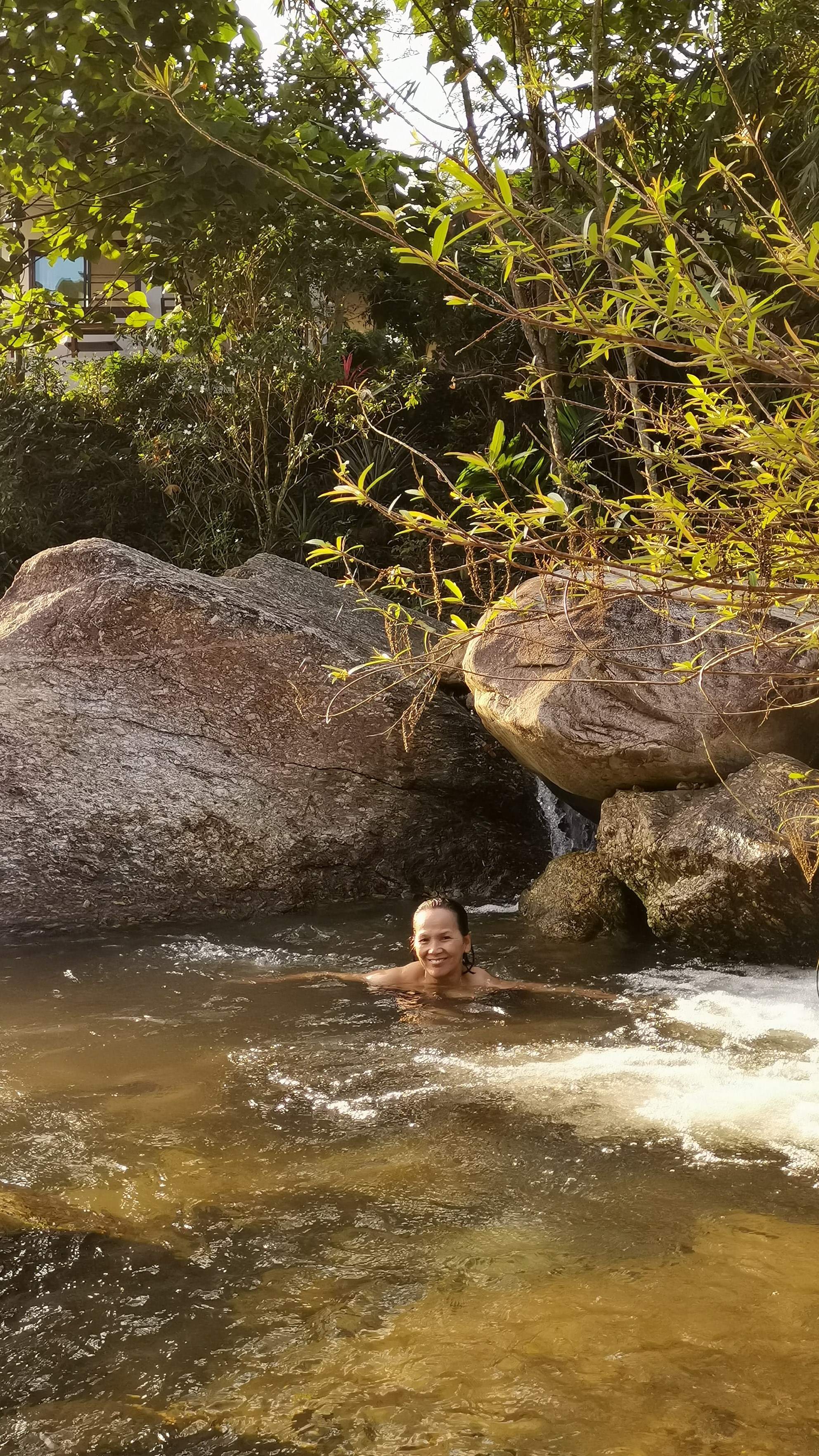 Private stairway access to shaded riverside rock pools and pristine mountain water at Chaba Riverside Home.